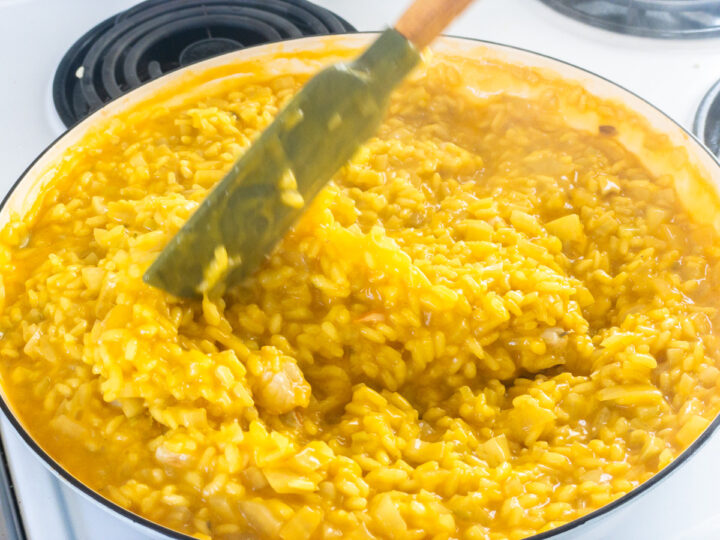 Chopped prawn meat added to prawn and saffron risotto at the end of cooking.