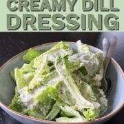 Fresh cos lettuce salad with creamy dill dressing in a bowl.